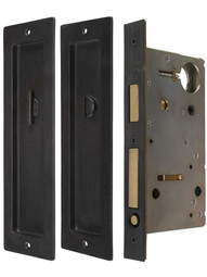 Solid Bronze Pocket Door Mortise-Lock Set with Rectangular Pulls.
